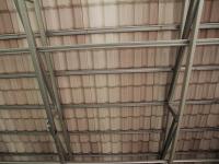 Pemasangan Eliteroof Dilihar dari Bawah Bangunan